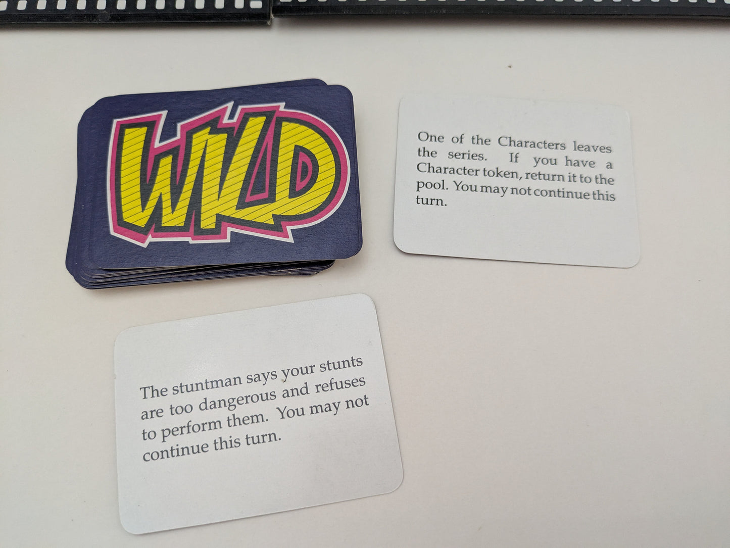 Collect characters, extras, and wild cards in The Neighbours Game (1988) to score points and create scenes.