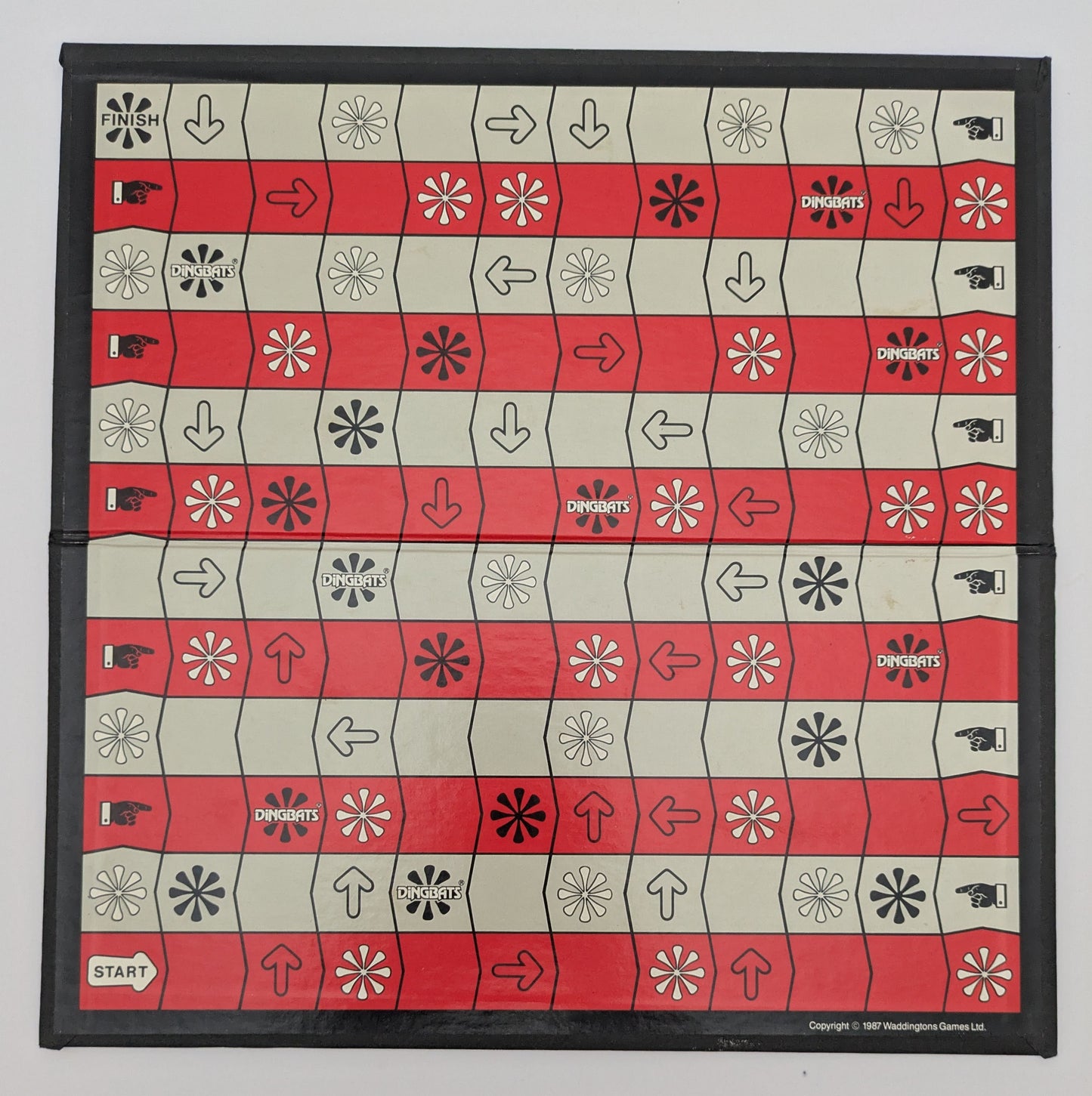 Dingbats (1987) challenges you to solve picture puzzles that test your wit and imagination.