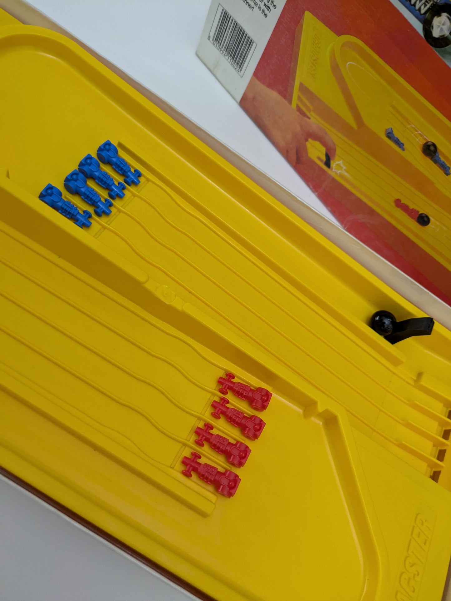 Complete Dragster (1976) game setup with racing track, marble shooters, and cars ready for an action-packed race.