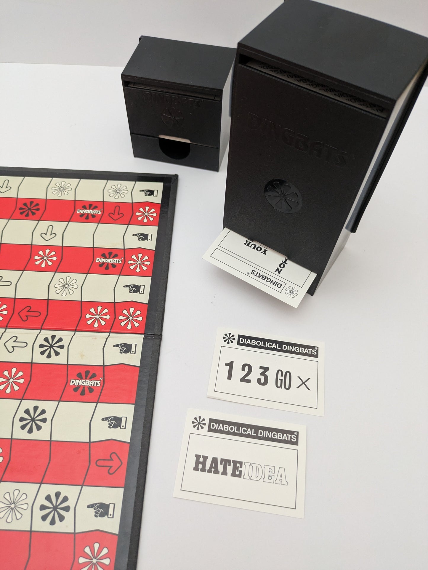 Experience the brain-teasing fun of Dingbats (1987) where every clue is a puzzle to crack.