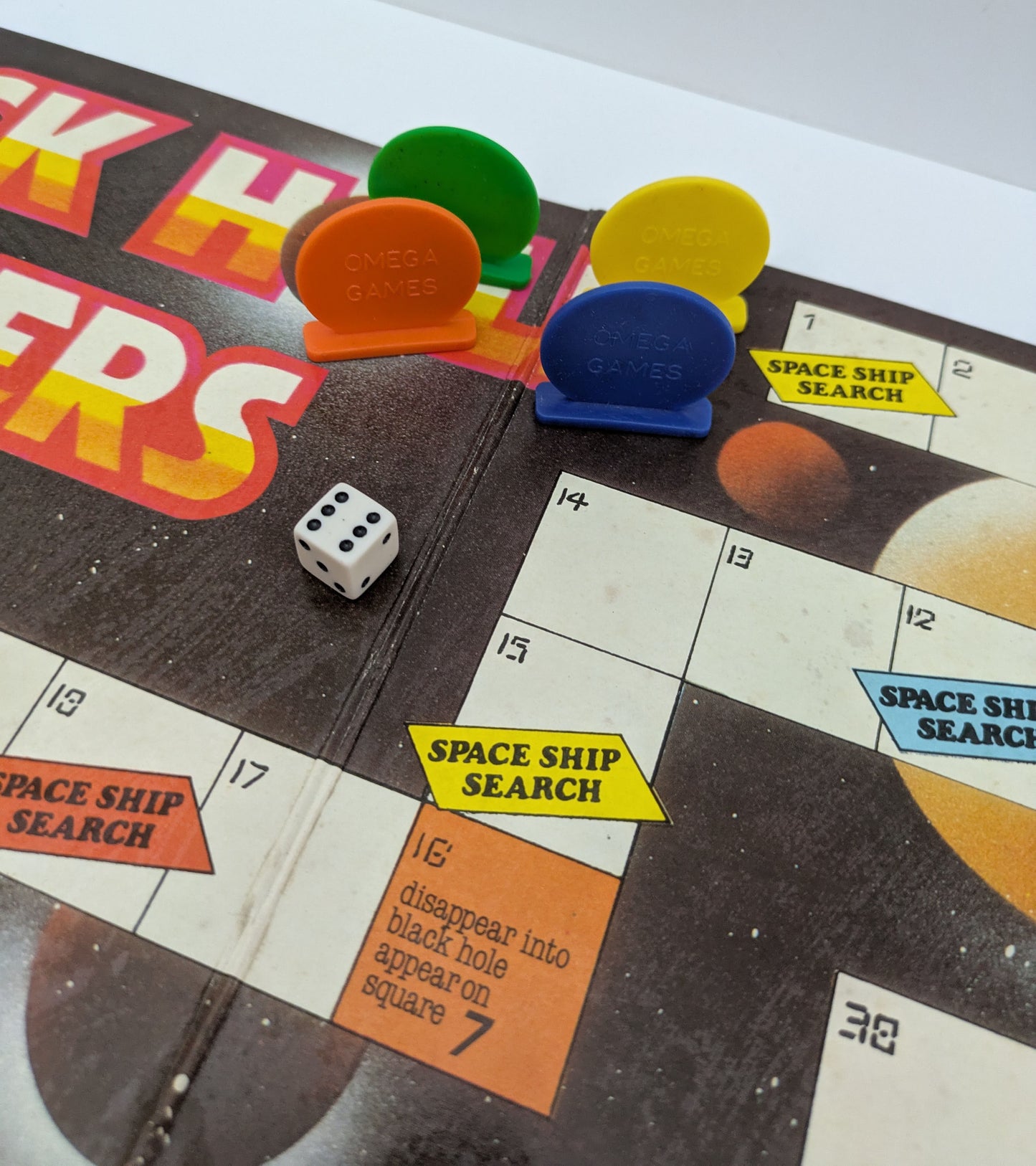 Outwit your opponents and dodge danger in the retro space race game Black Hole Invaders (1970).
