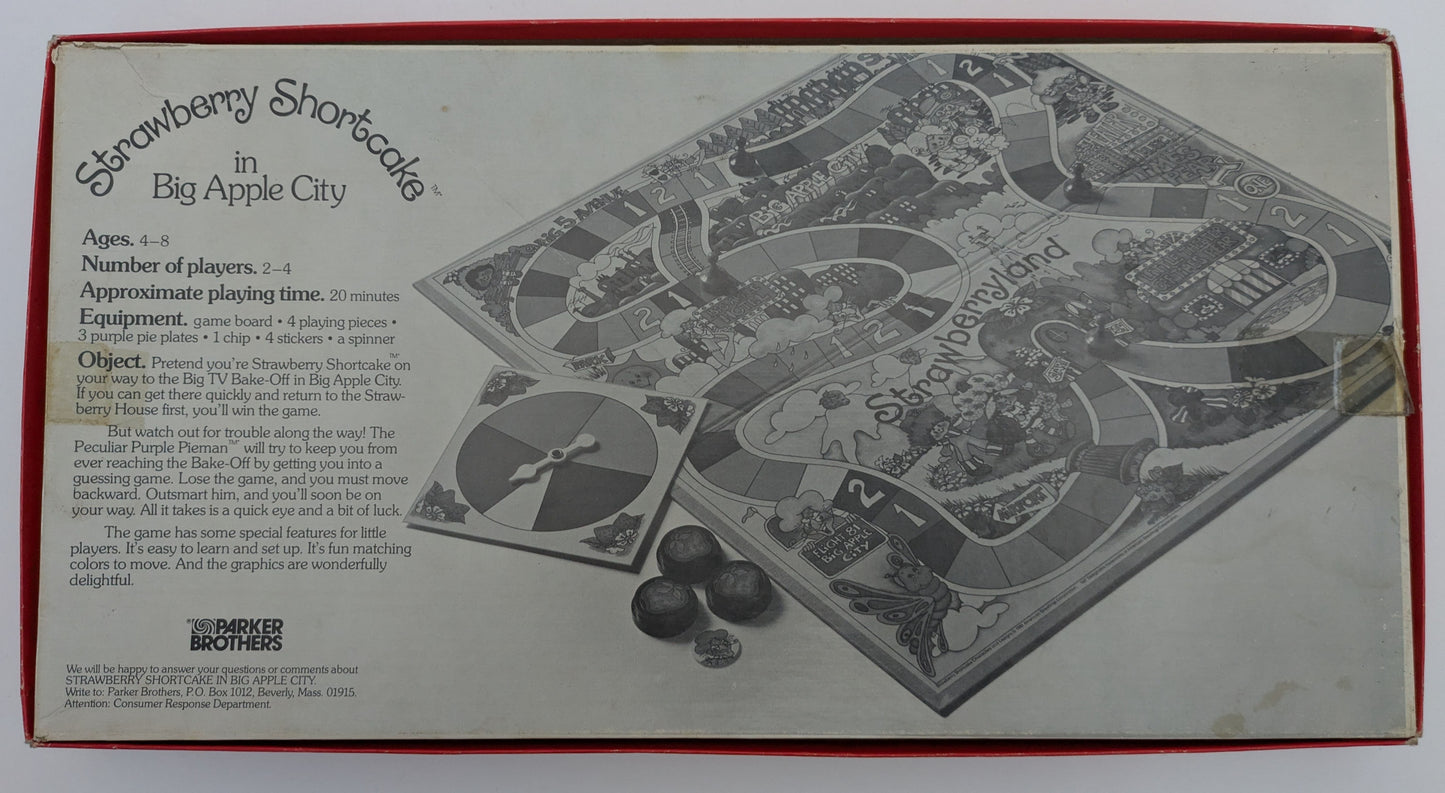 Strawberry Shortcake game instructions showing how to spin, move, and avoid the Pieman while racing to the bake-off.