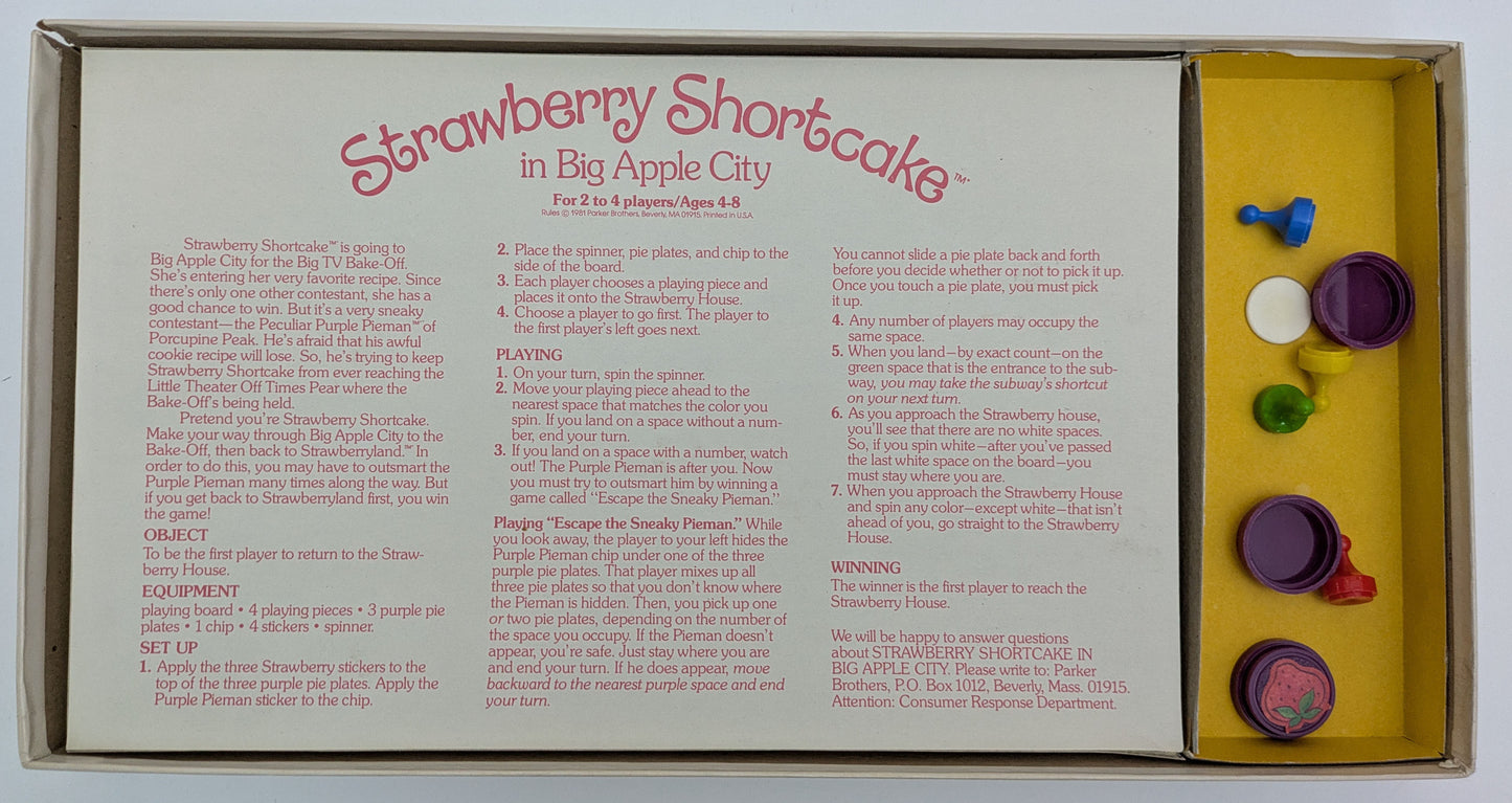 Strawberry Shortcake game instructions showing how to spin, move, and avoid the Pieman while racing to the bake-off.