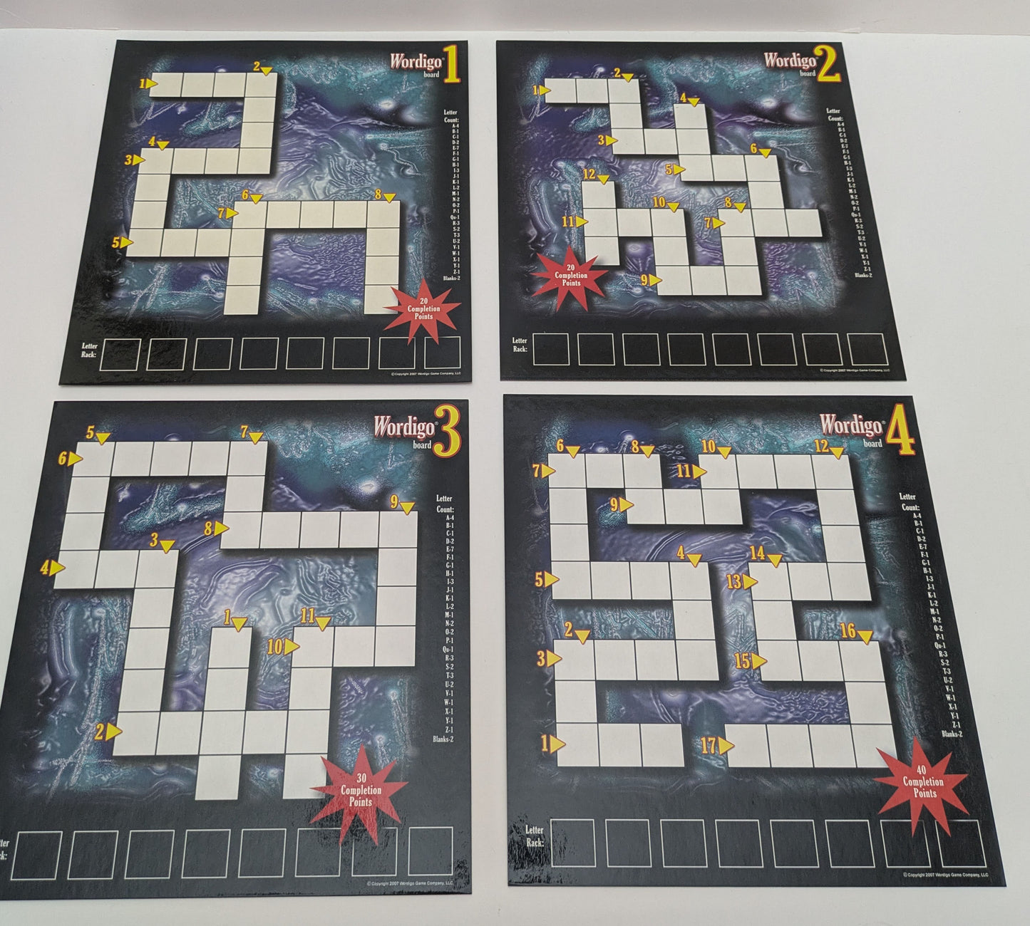 Play Wordigo (2007) for a fun mix of speed, vocabulary, and clever tile placement.