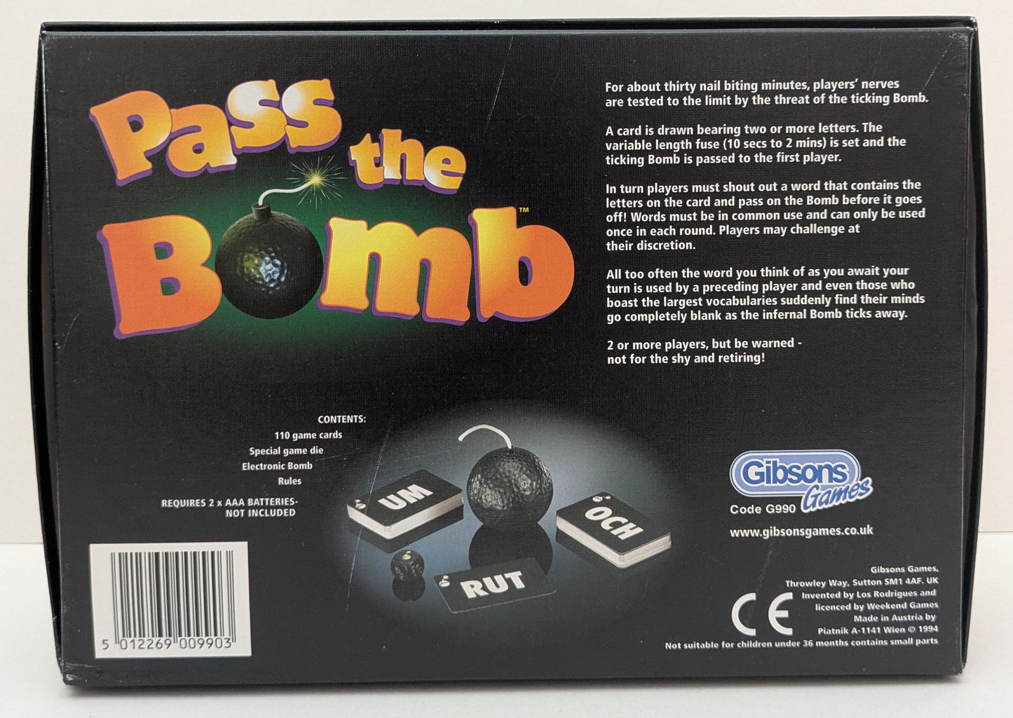 Players roll the die in Pass the Bomb (1994) to decide how the letters must be used in their words.
