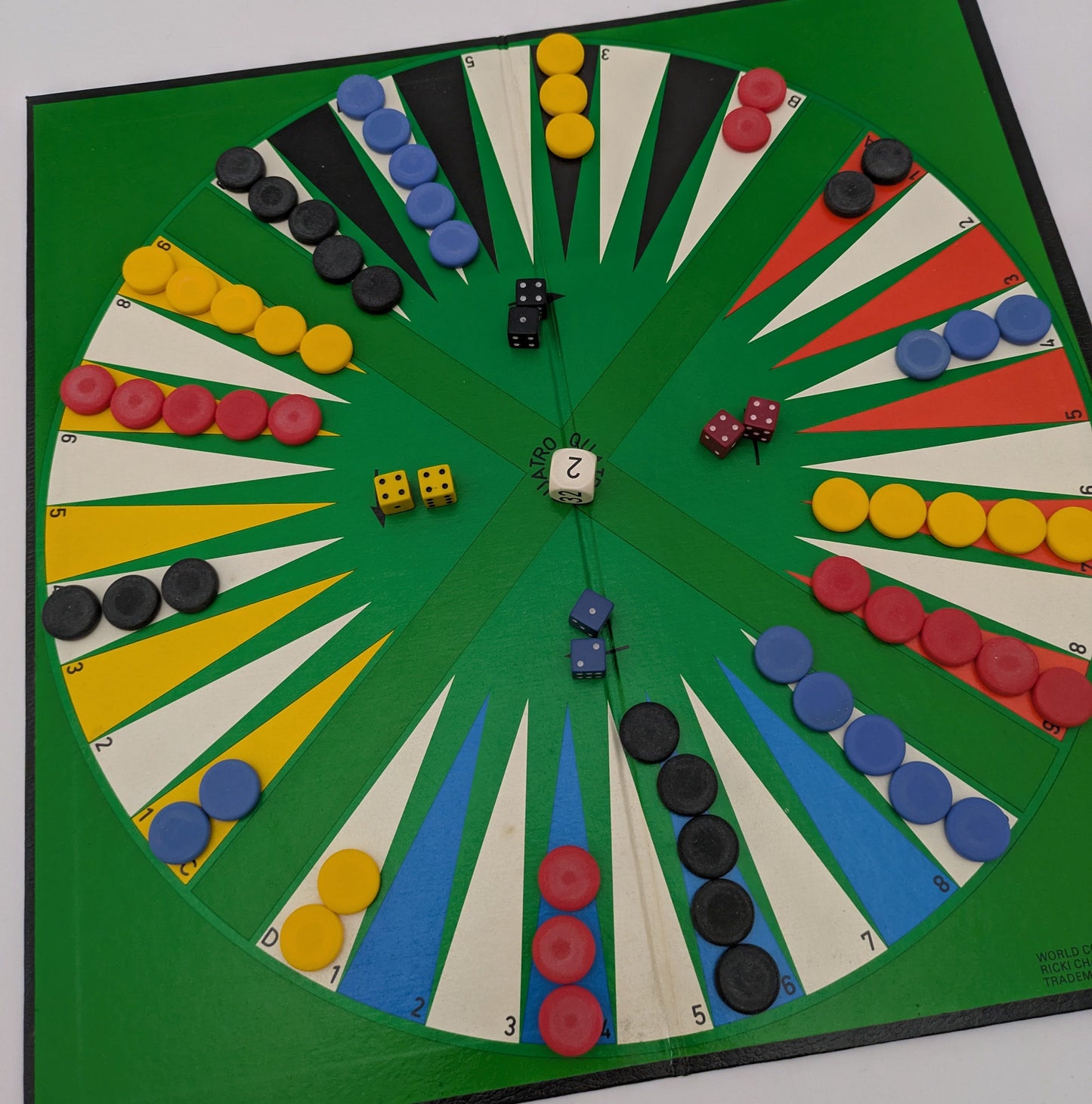 Quatro Gammon (1982) turns classic backgammon into a four-player showdown