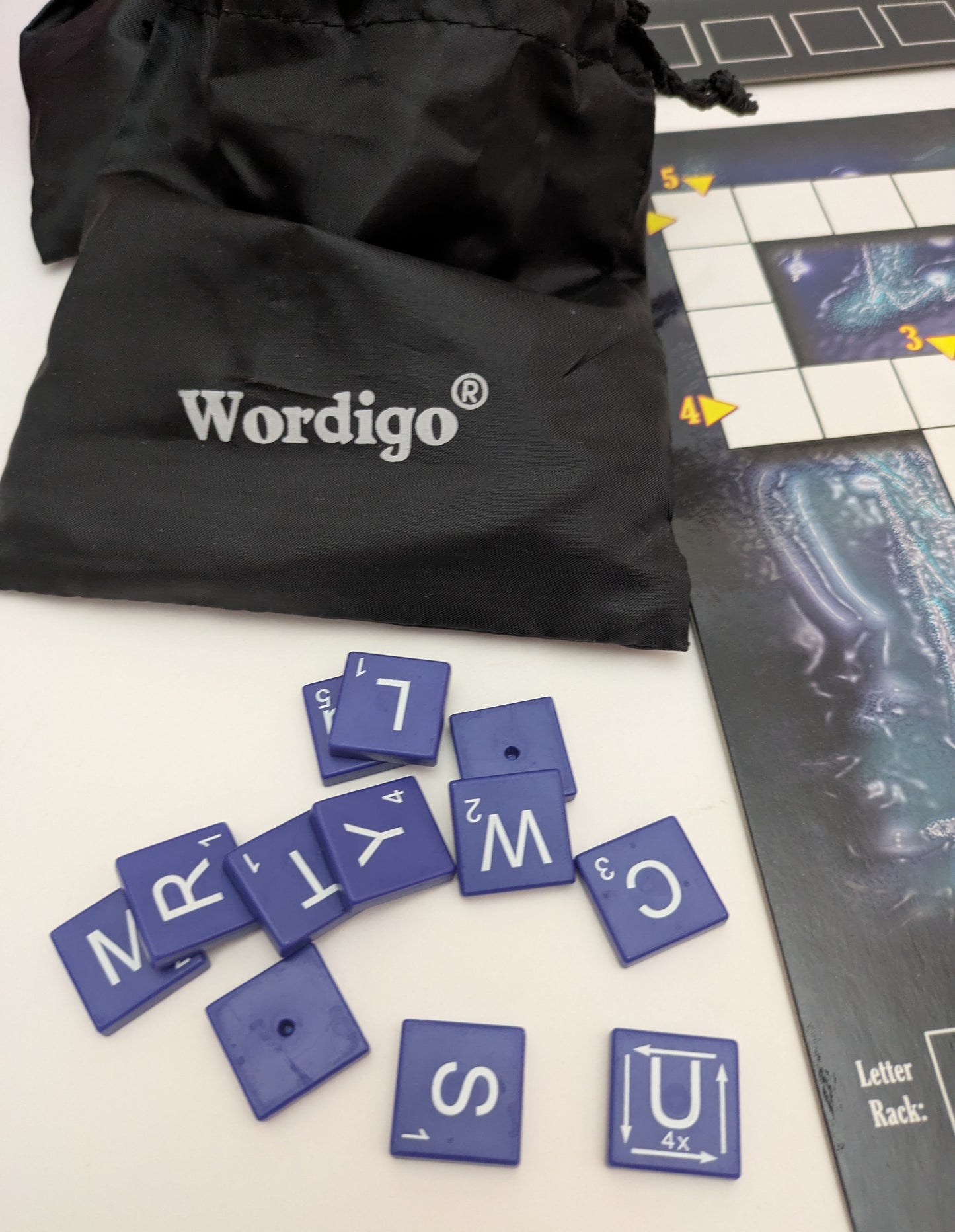 Race to score big with Wordigo (2007), the tile game that rewards sharp thinking and quick spelling.