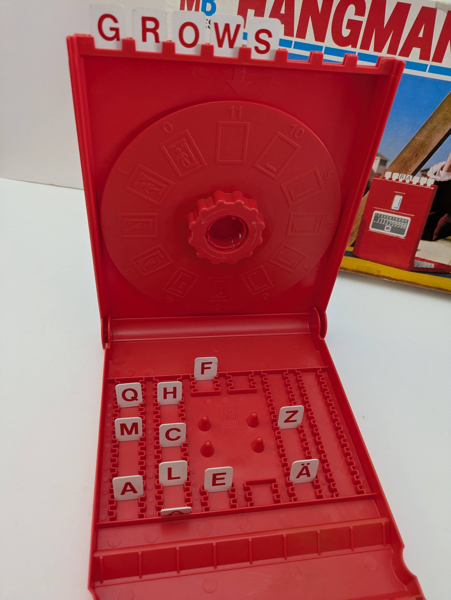Relive the fun of Hangman (1977), the Milton Bradley retro favourite of letters and words.
