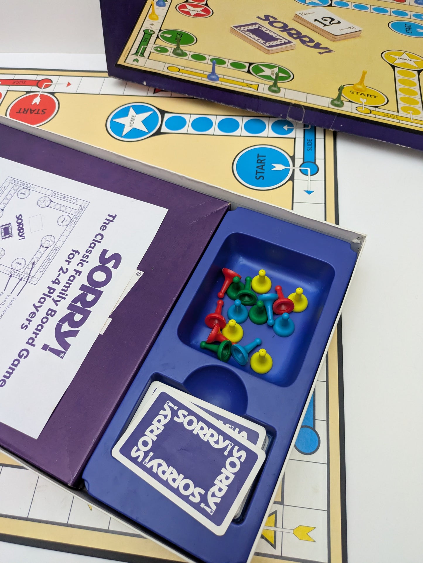 Slide your way to victory or say “Sorry!” when you ruin someone’s turn – that’s Sorry! (1988).