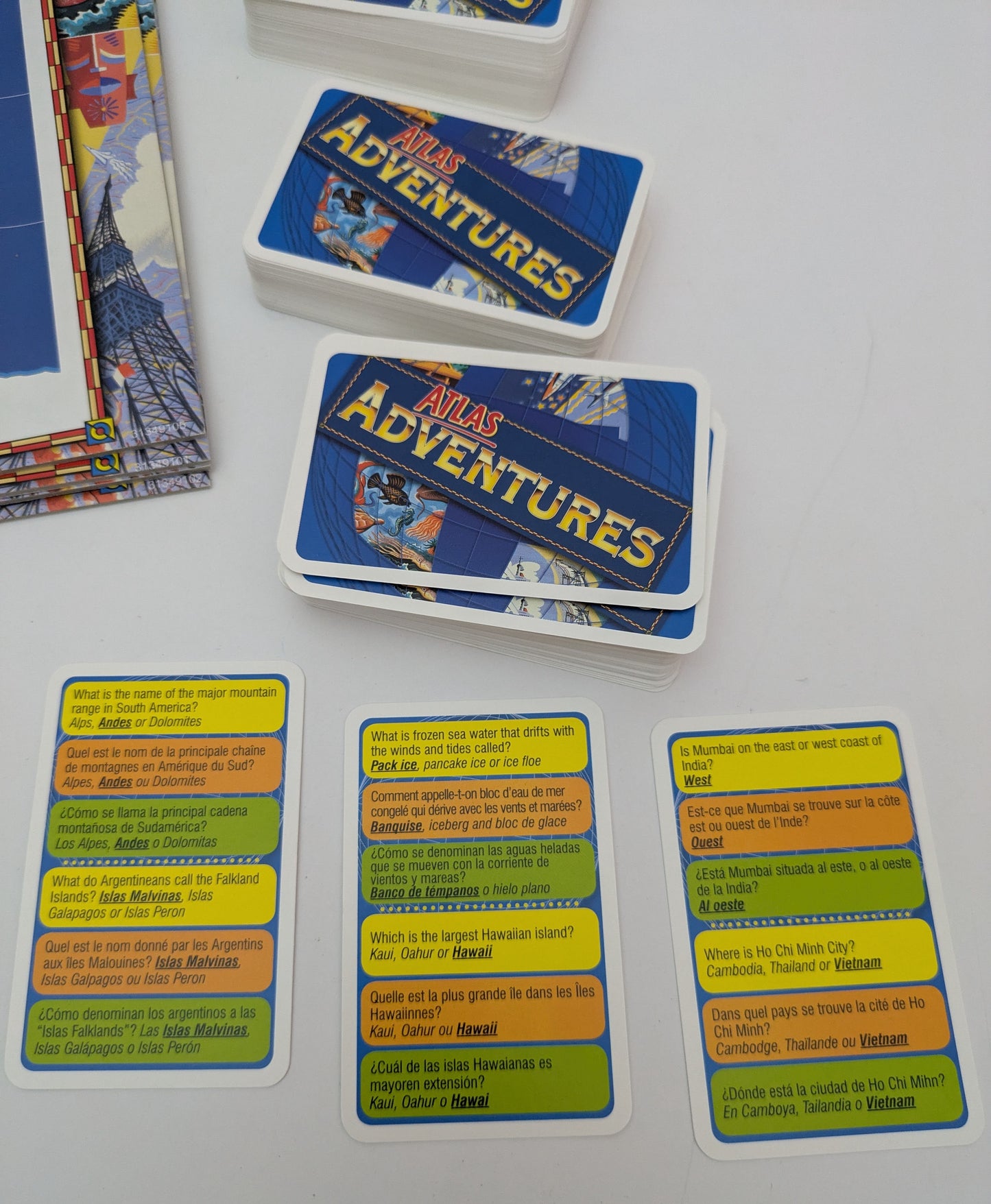 Spin, answer, and collect in Atlas Adventures (1996), the family board game that makes maps and memory fun.
