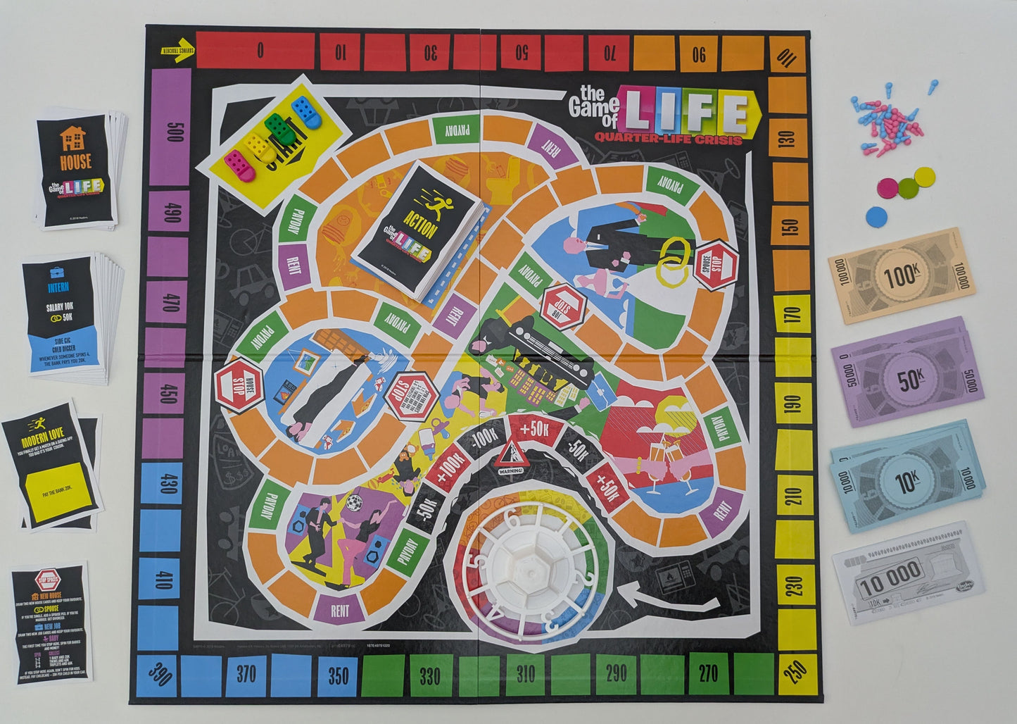Spin your way through stress, bills, and bad decisions in The Game of Life Mid-Life Crisis (2018).