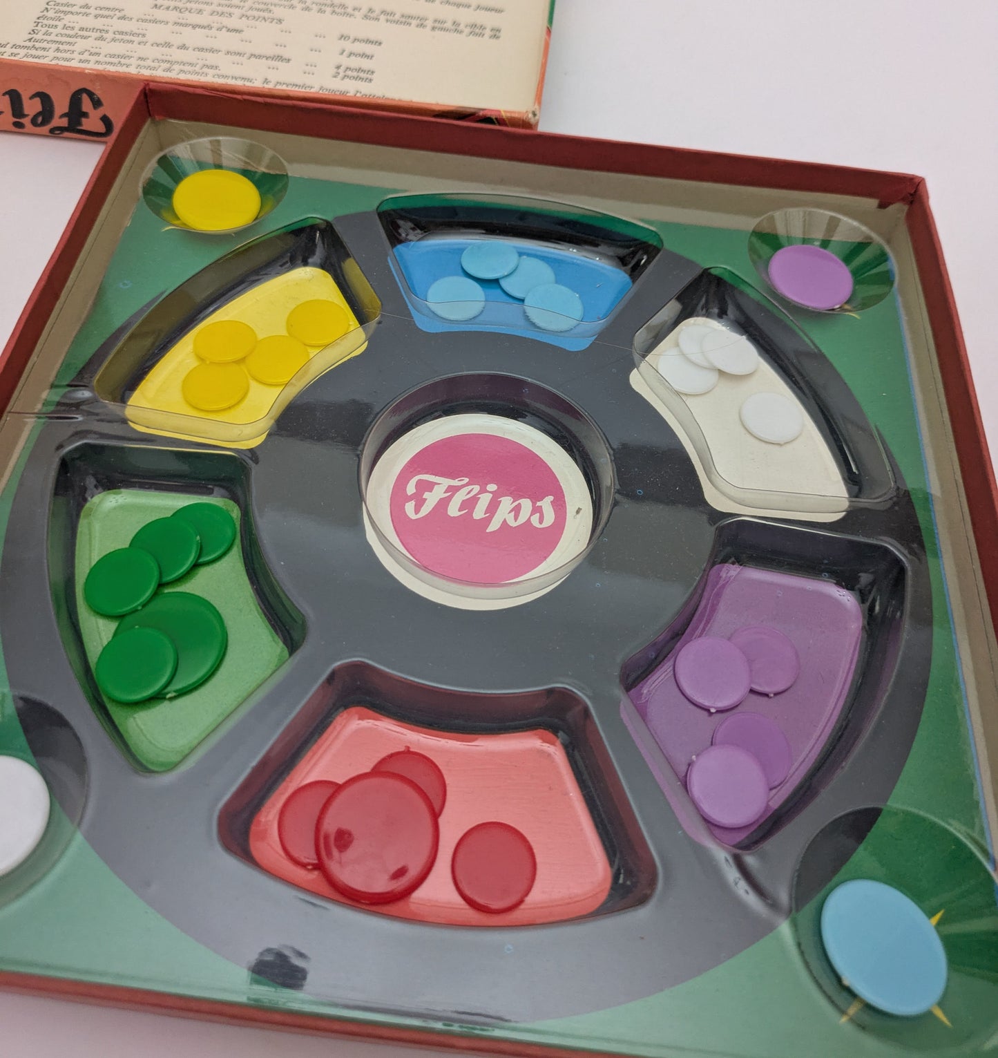 Step back in time with Flips (1953) – the vintage game of skill that’s all about precision and fun!