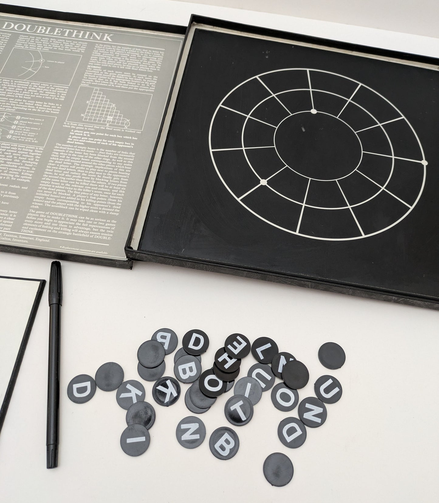 Step into the world of pure strategy with Doublethink (1977), a rare abstract board game for two players.