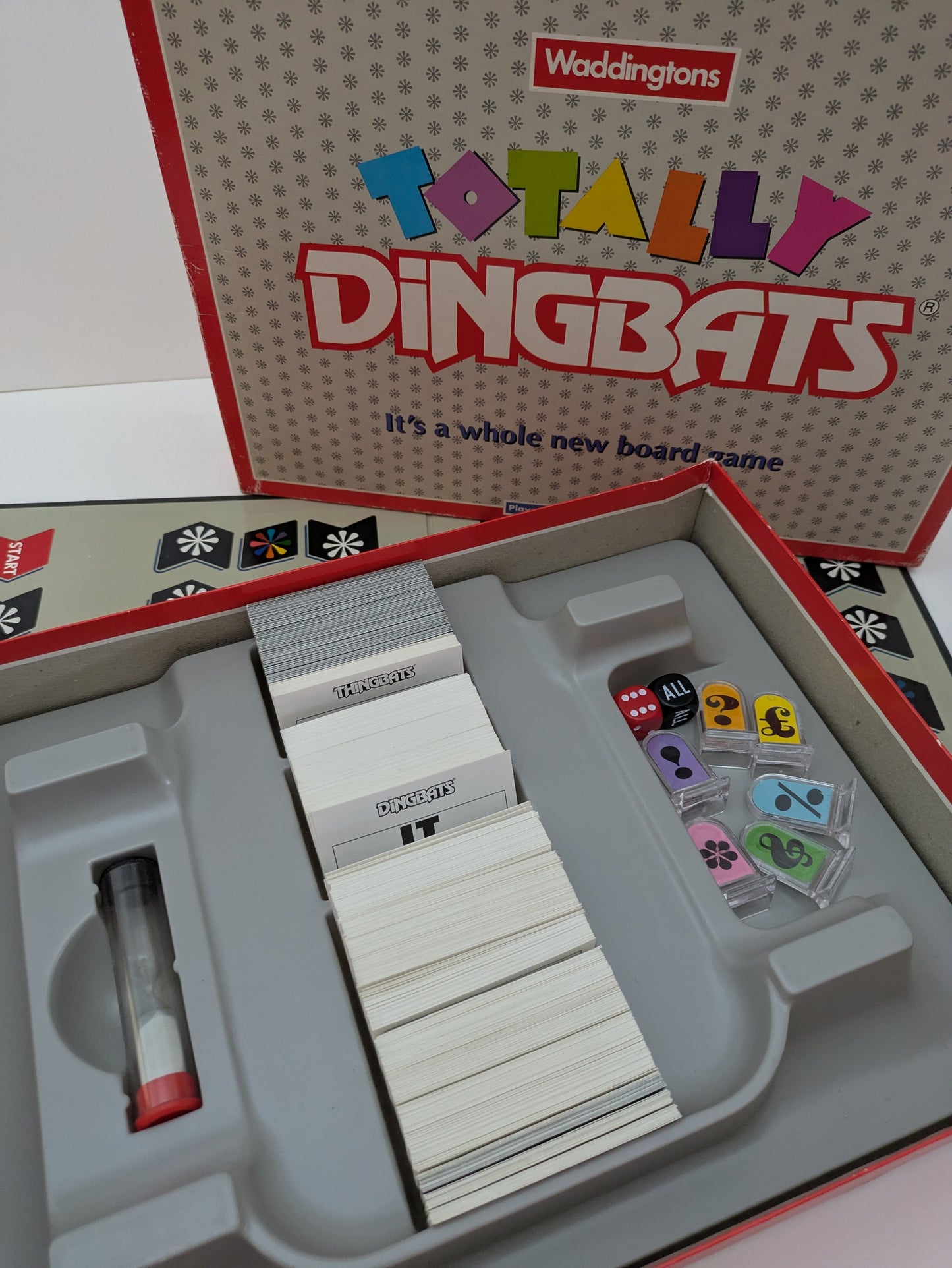 Step into the world of riddles with Totally Dingbats (1990) – a brain-teasing race to crack the code before time runs out.
