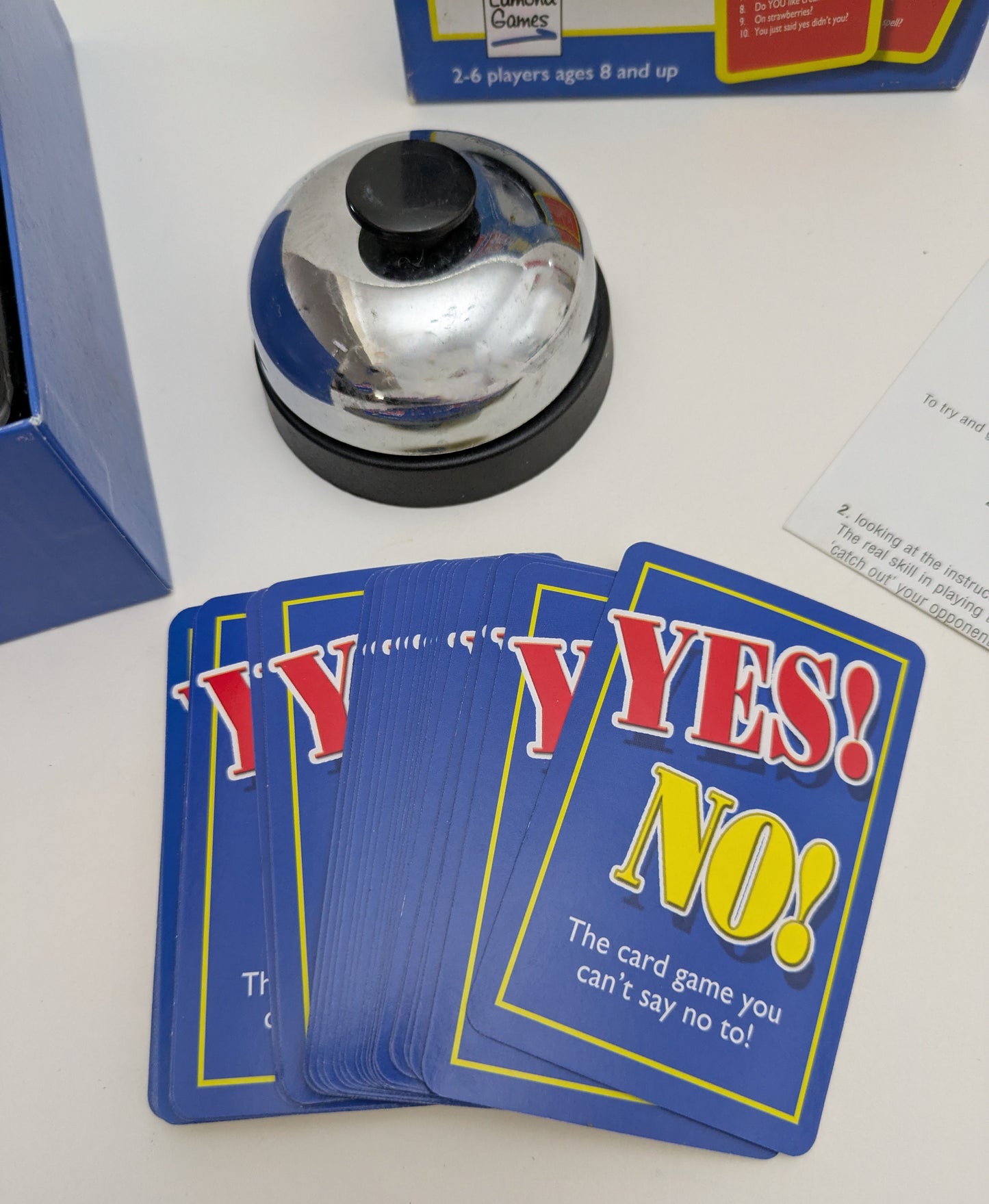Step up to the challenge with Yes! No! (2008), the fast-paced game where saying the wrong word could cost you the win.