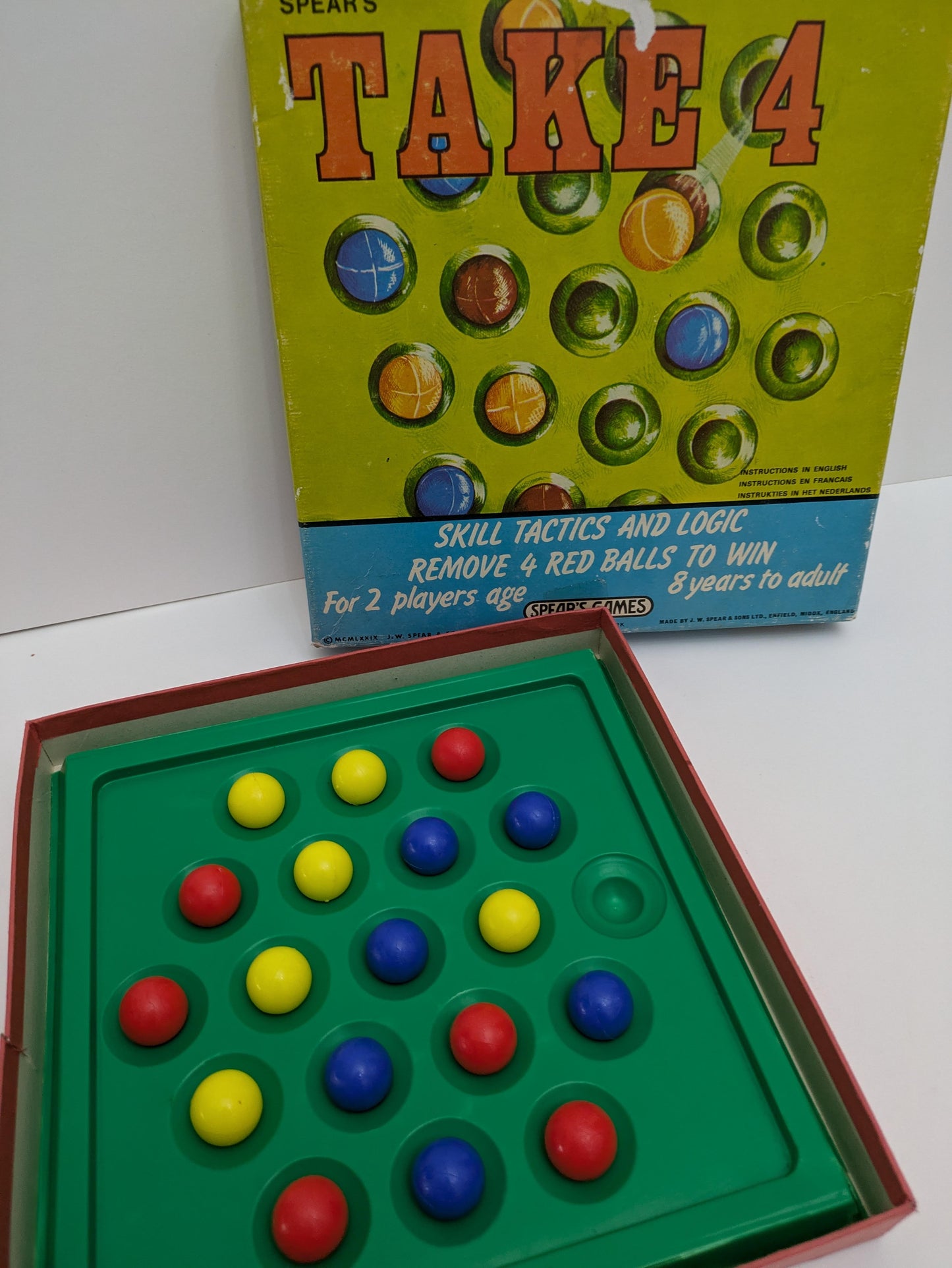 "Take 4 (1970) game box featuring classic Spears Games design, coloured game pieces, and strategy-driven gameplay visuals."