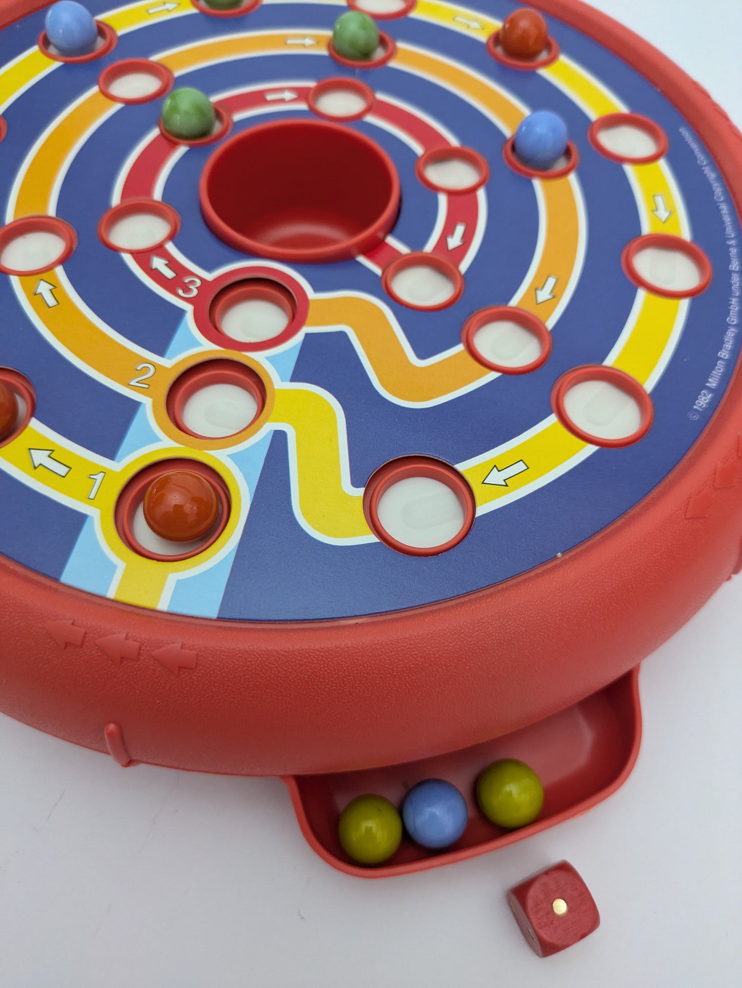 Trap Door (1982) – Vintage family fun with dice, marbles, and unpredictable trap doors.