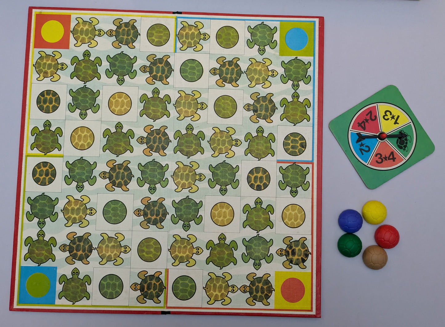 "Twisty Turtle (1982) game box featuring colourful turtles and a race-themed game board, highlighting fun and competitive gameplay."
