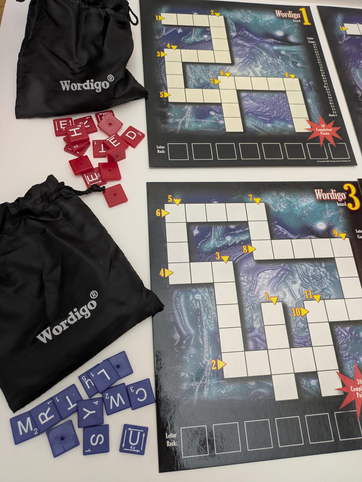 Wordigo (2007) is the fast-paced word game where spelling meets strategy in a race against the clock.