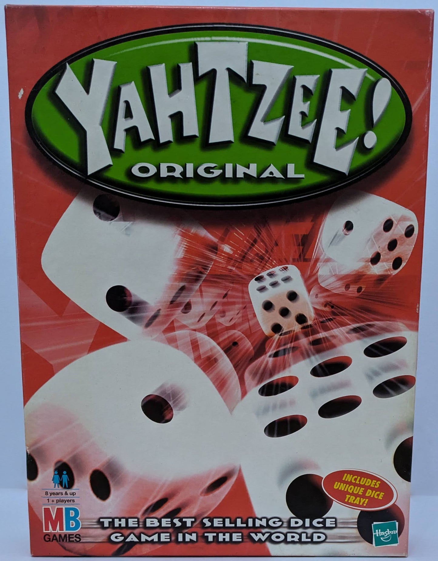 "Yahtzee game box featuring dice, scorecards, and the classic game logo highlighting timeless dice-rolling fun."