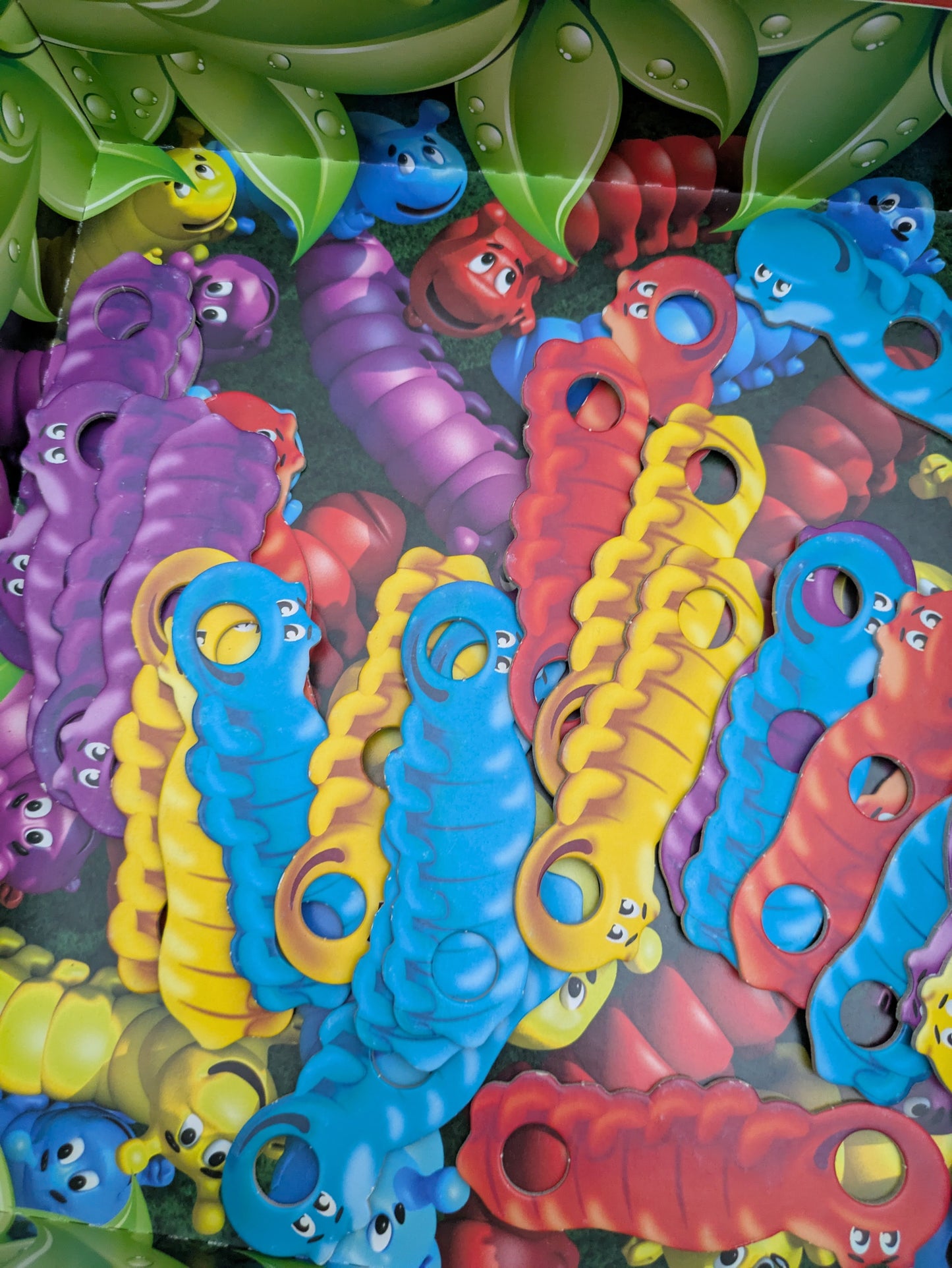 Add a splash of fun to game night with Colourful Caterpillars (1986)