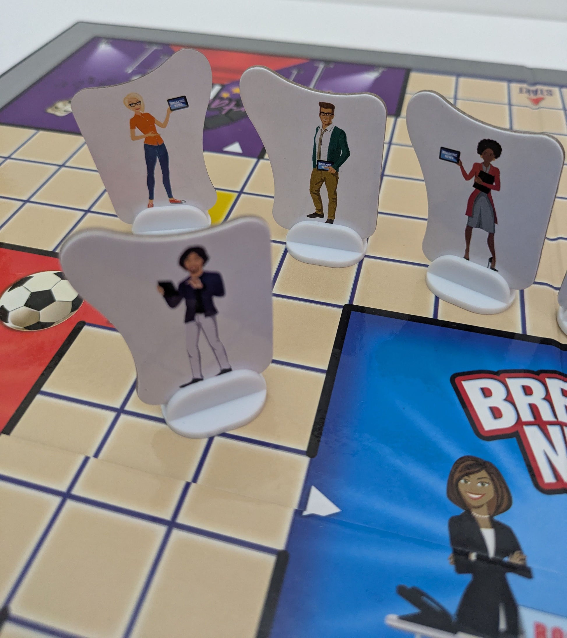 Breaking News (2005) works well for mixed ages, with adults and children playing on equal ground