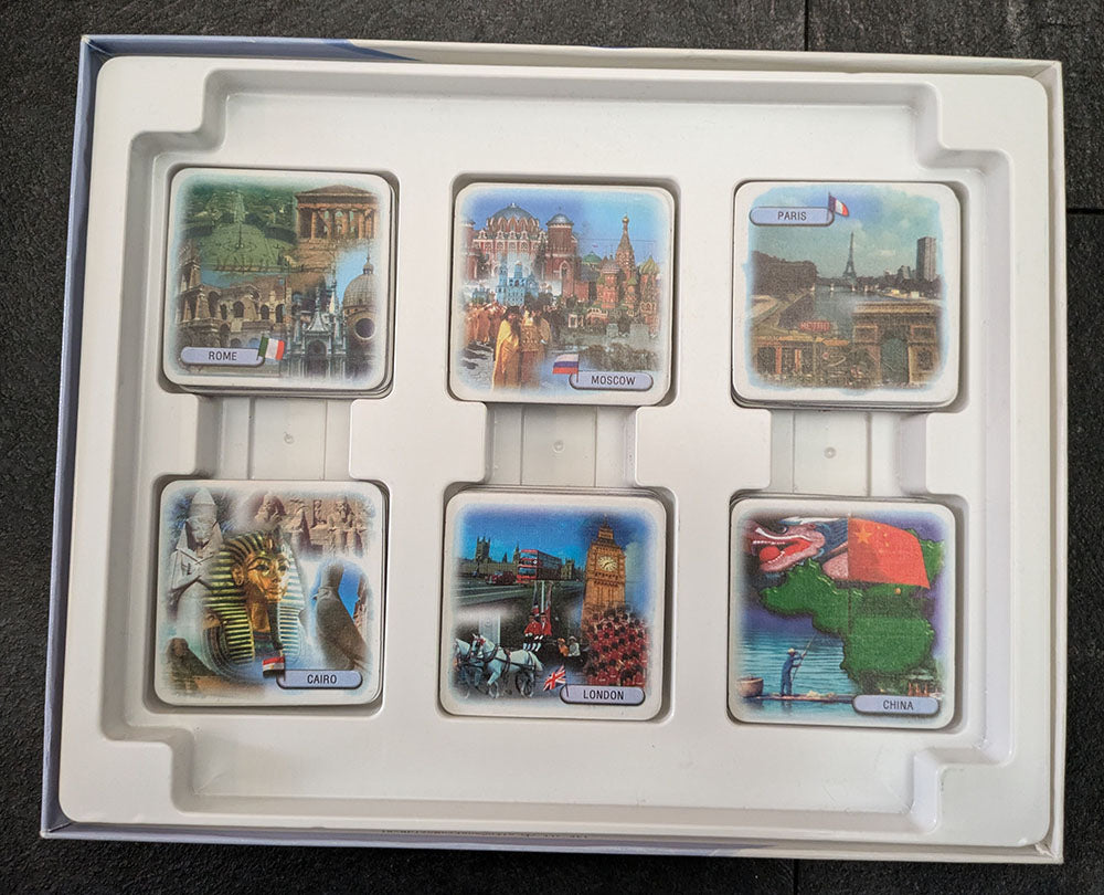 "City Country World game box featuring a colourful world map, country flags, and trivia cards emphasizing educational and interactive gameplay."