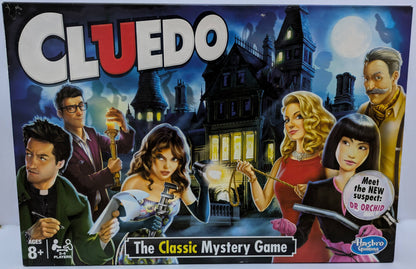 Cluedo (2012) game box featuring iconic suspects, weapons, and mansion visuals with the game logo highlighting classic mystery gameplay.