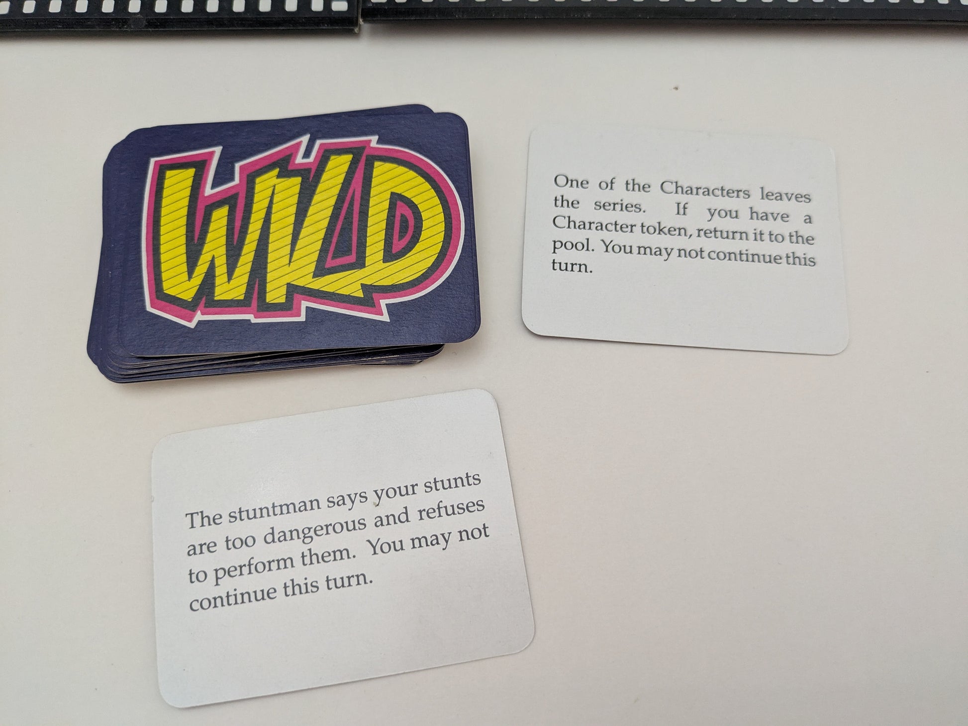 Collect characters, extras, and wild cards in The Neighbours Game (1988) to score points and create scenes.
