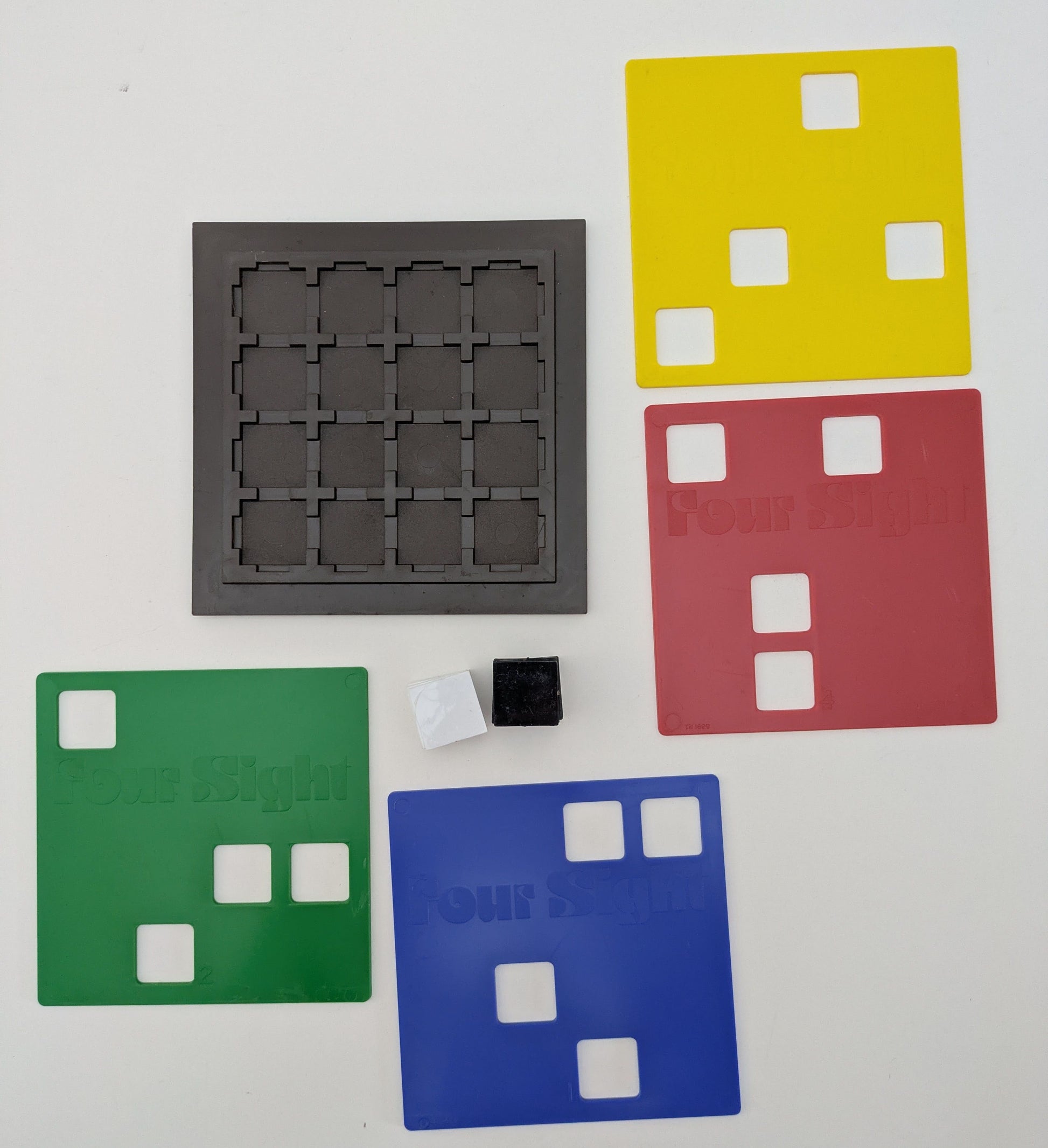 Discover the classic strategy of Four Sight, the 1975 Invicta board game of logic and patterns.