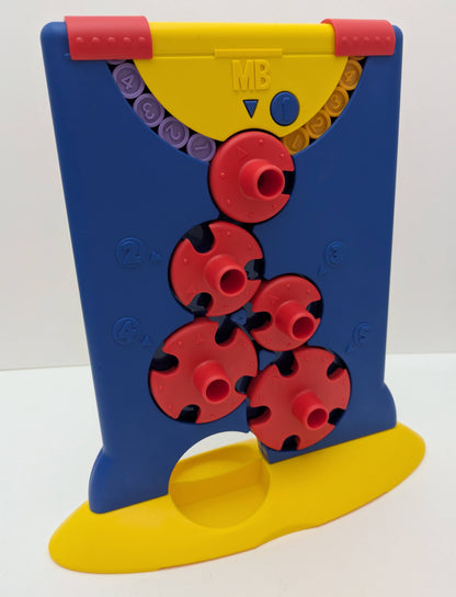 Downfall (1999) is a hands-on family board game that blends problem-solving with clever mechanical design.