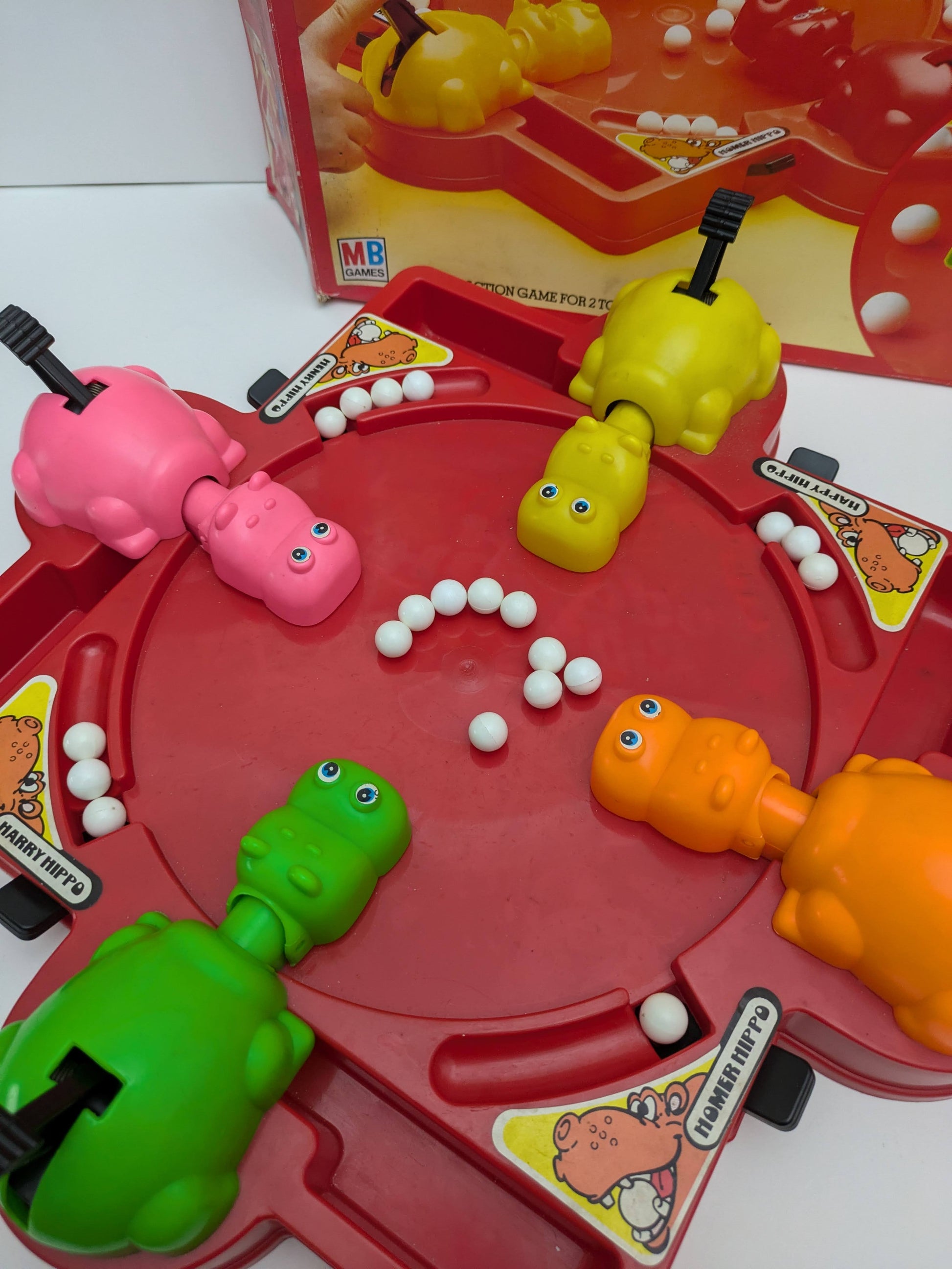 Complete Hungry Hungry Hippos setup with colourful hippos, marbles, and game base ready for fast-paced family fun.