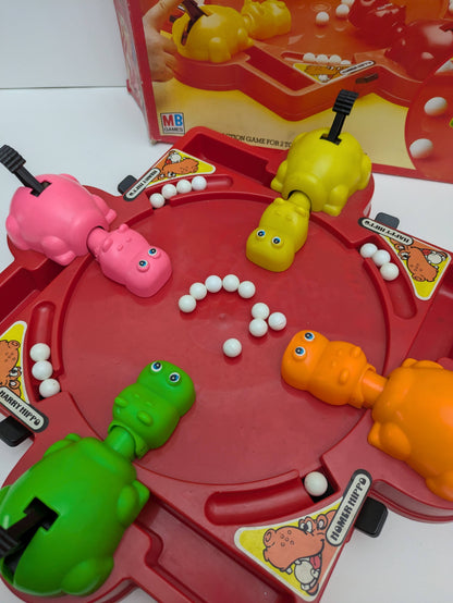Complete Hungry Hungry Hippos setup with colourful hippos, marbles, and game base ready for fast-paced family fun.