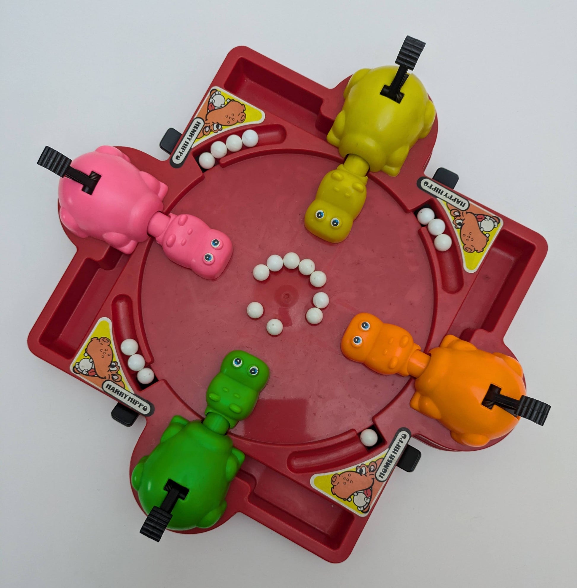 Complete Hungry Hungry Hippos setup with colourful hippos, marbles, and game base ready for fast-paced family fun.