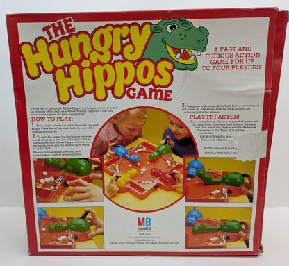 Detailed gameplay guide for Hungry Hungry Hippos explaining marble mechanics, scoring, and how to set up the game.