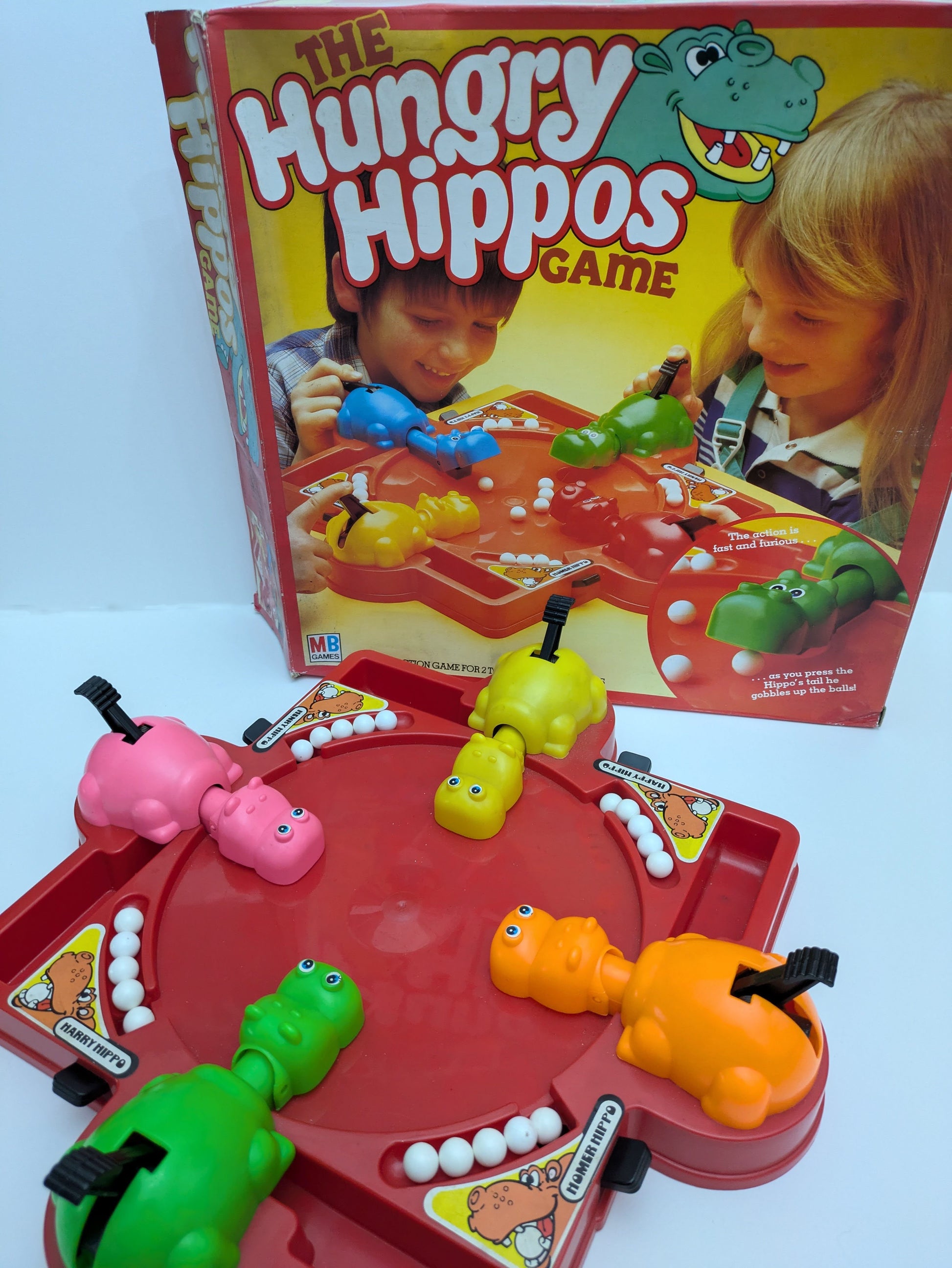 Complete Hungry Hungry Hippos setup with colourful hippos, marbles, and game base ready for fast-paced family fun.