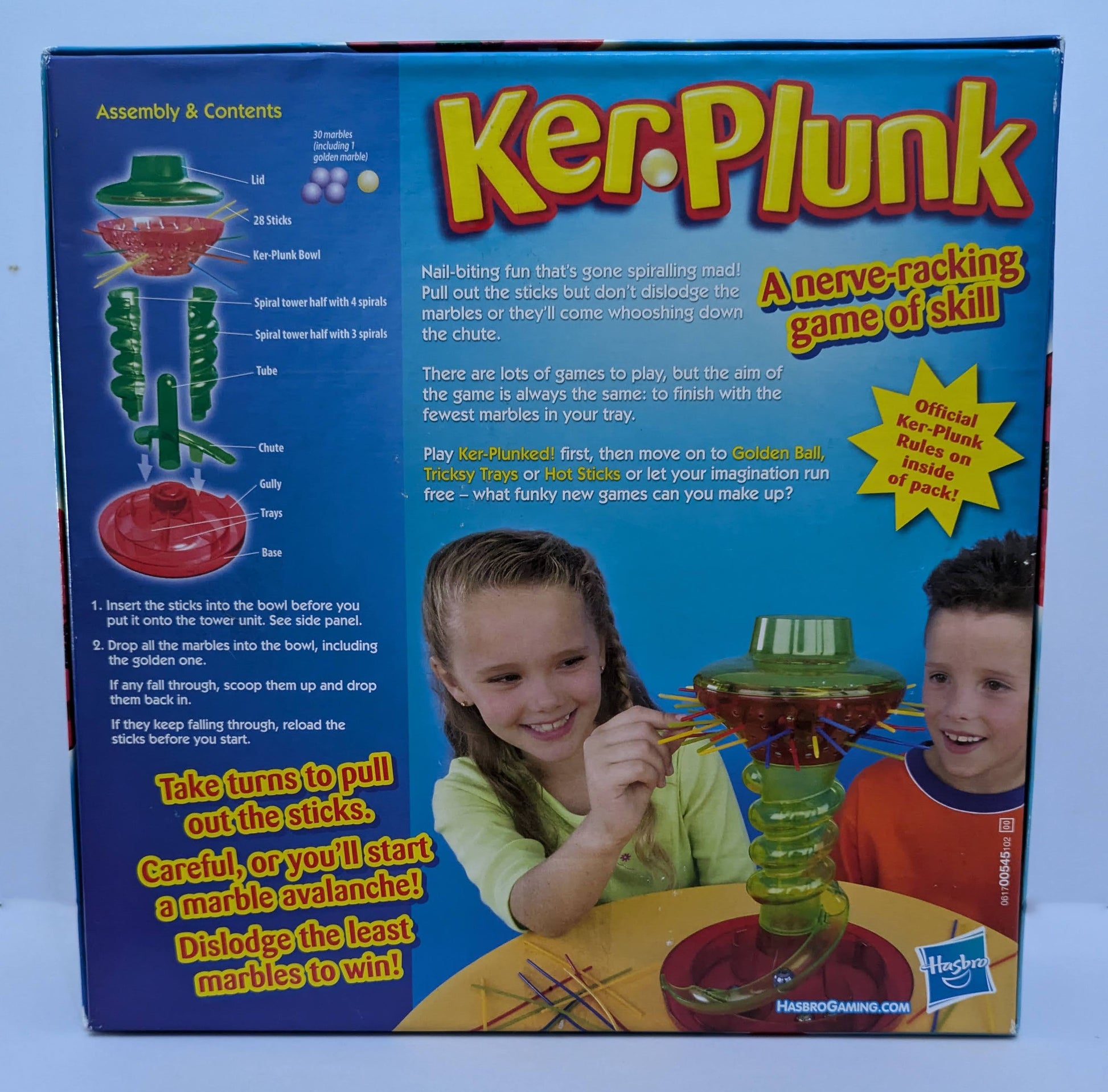 Detailed KerPlunk gameplay guide explaining how to pull sticks, avoid marbles, and score the fewest marbles to win.