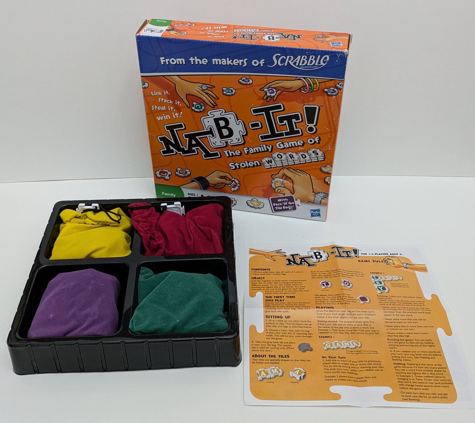"Detailed Nab-It gameplay, stacking letter tiles, form words, and win points by claiming words on the board."