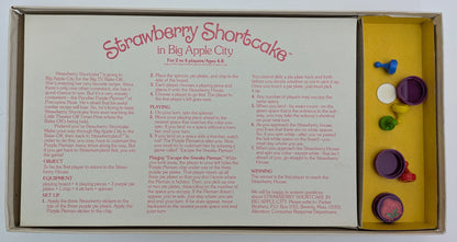 Strawberry Shortcake game instructions showing how to spin, move, and avoid the Pieman while racing to the bake-off.