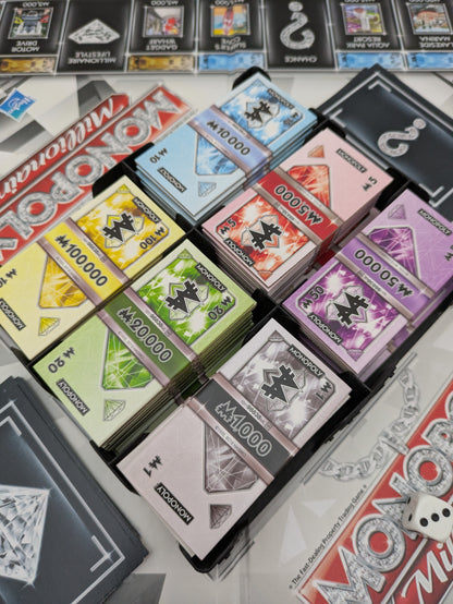 Reach a million first in Monopoly Millionaire (2012) – no bankruptcies needed!