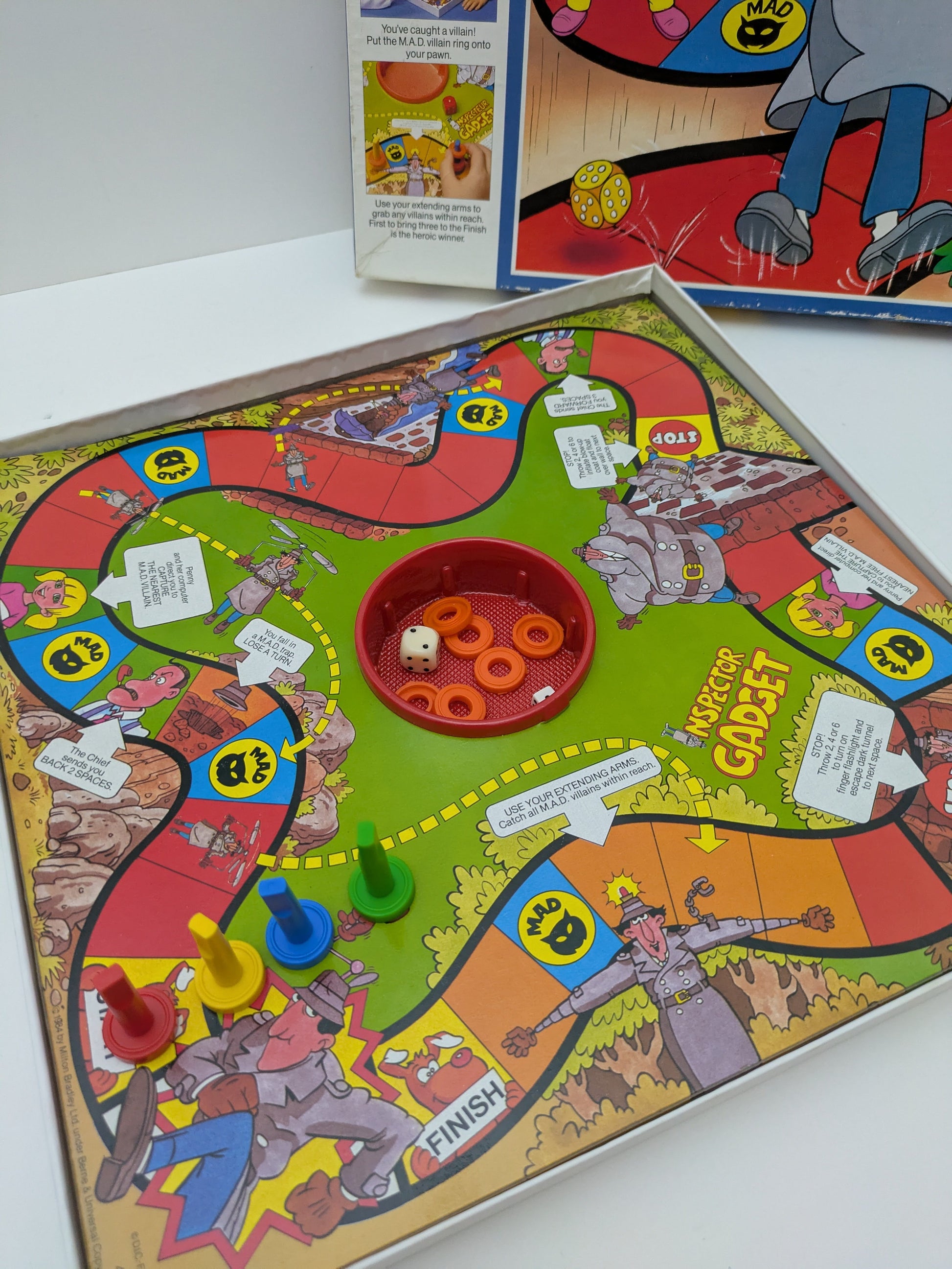 Relive the fun of the classic 80s cartoon with Inspector Gadget (1984) the board game for families.