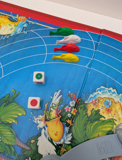 Shark Chase (1989) brings non-stop action as players race to be the last uneaten fish.