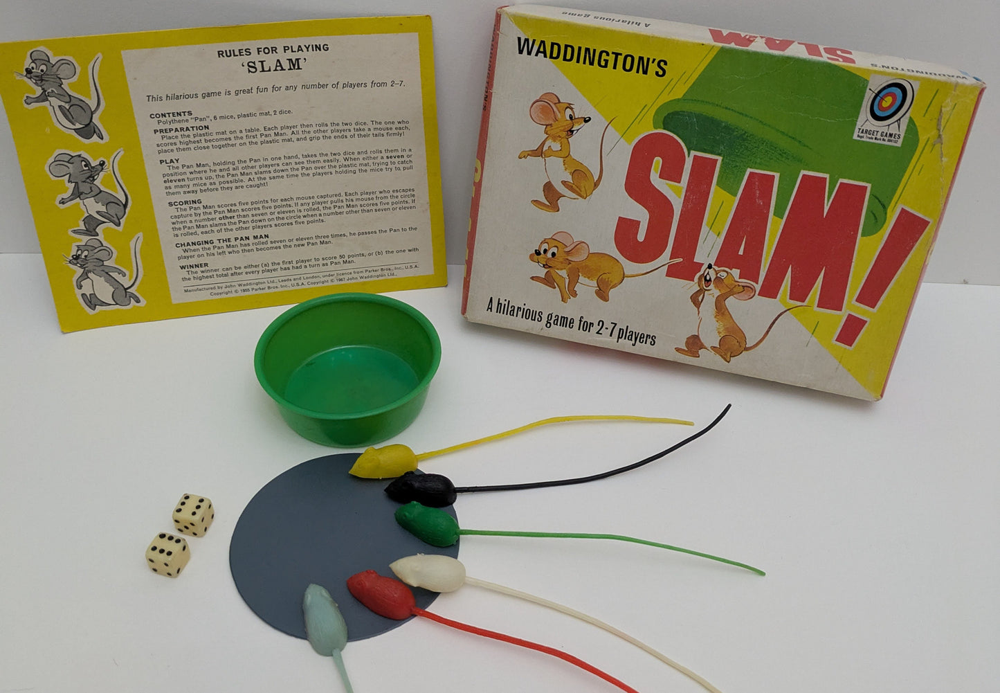 Slam (1967) challenges players to grab their mice before the pan slams down.
