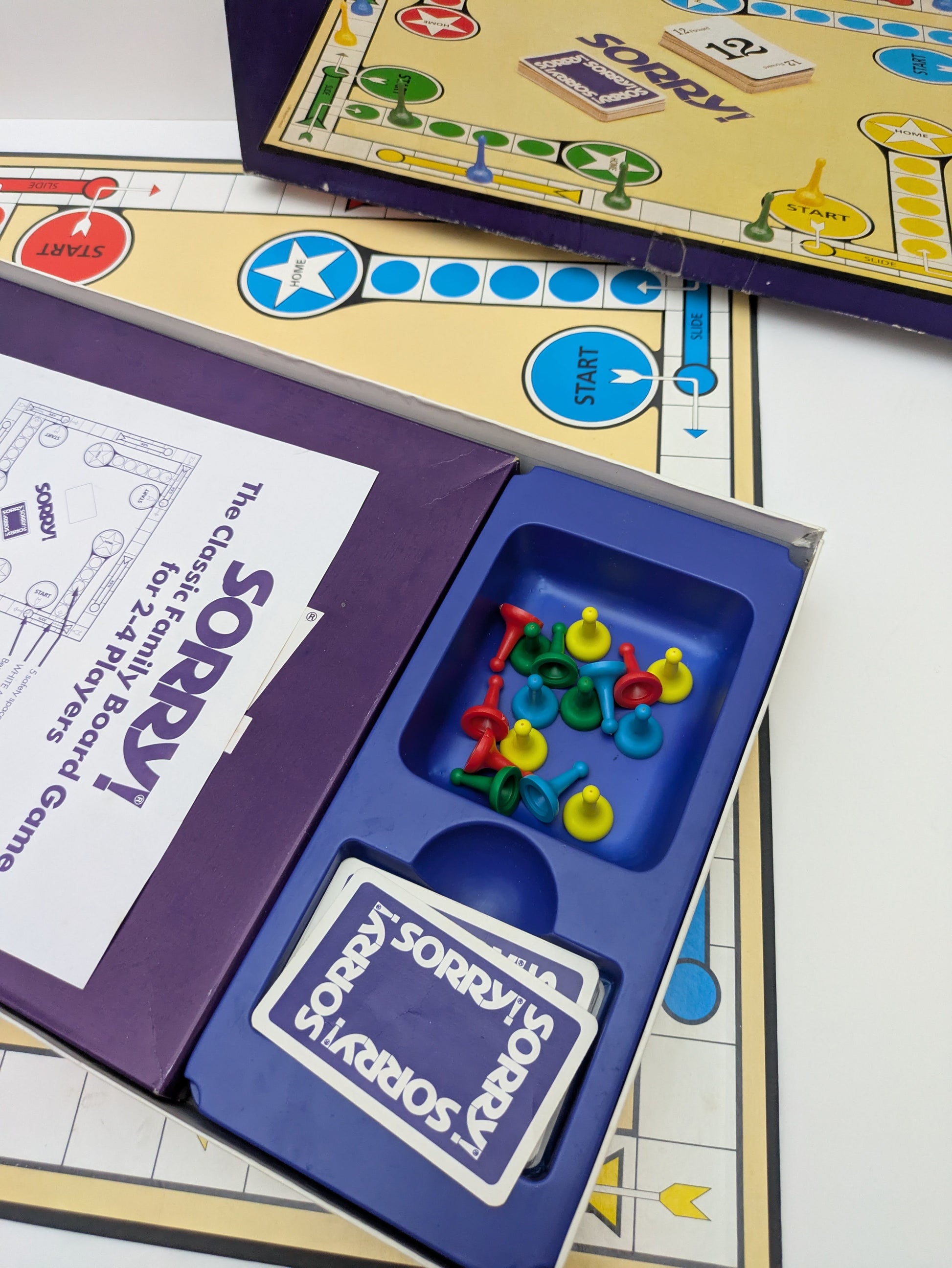 Slide your way to victory or say “Sorry!” when you ruin someone’s turn – that’s Sorry! (1988).