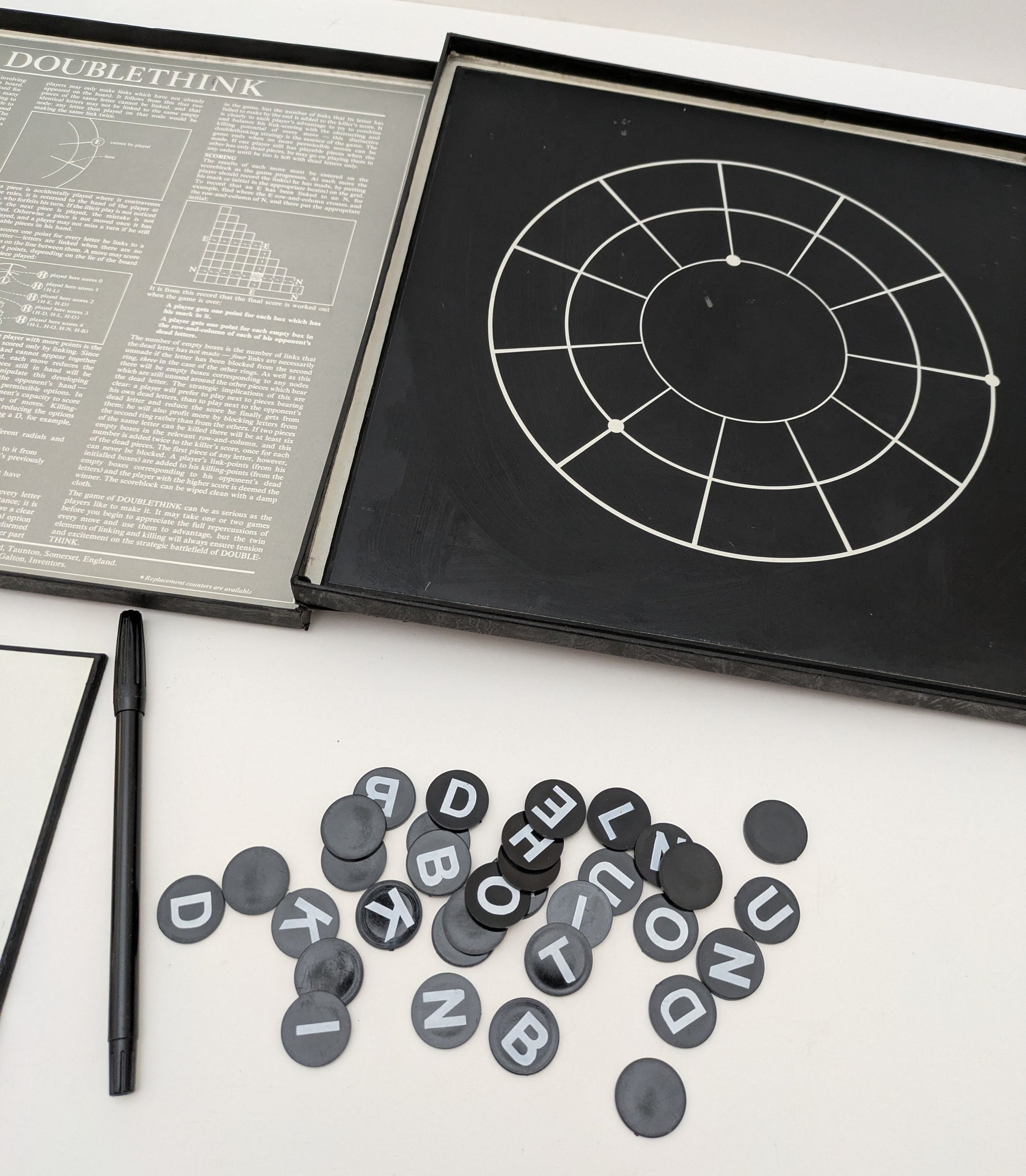 Step into the world of pure strategy with Doublethink (1977), a rare abstract board game for two players.
