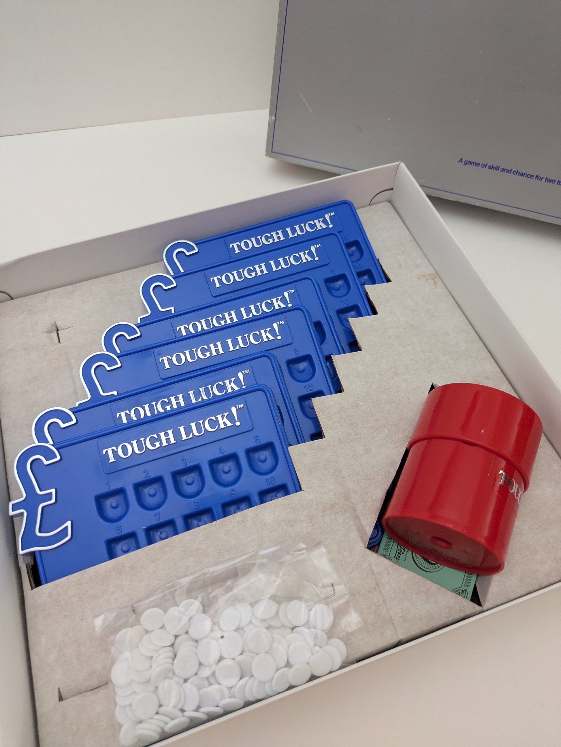 Test Your Nerve with Tough Luck (1987) – The Classic Ball-Auction Game with a Twist