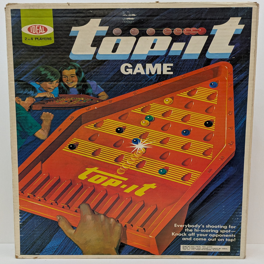 Top-It (1972) – Classic Marble Skill Game