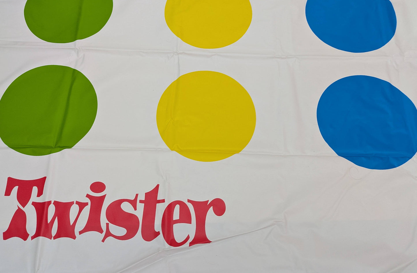 Twister (2012) is a classic action game that brings energy and movement to any gathering.