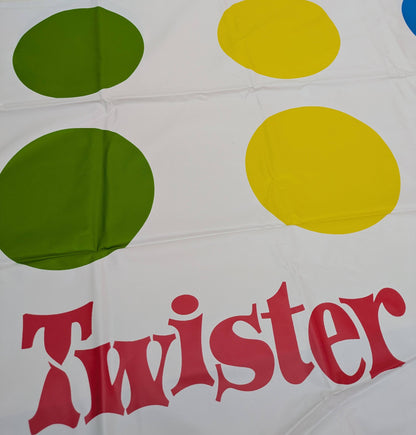 Twister (2012) turns simple spins into hilarious moments as players try not to topple over.
