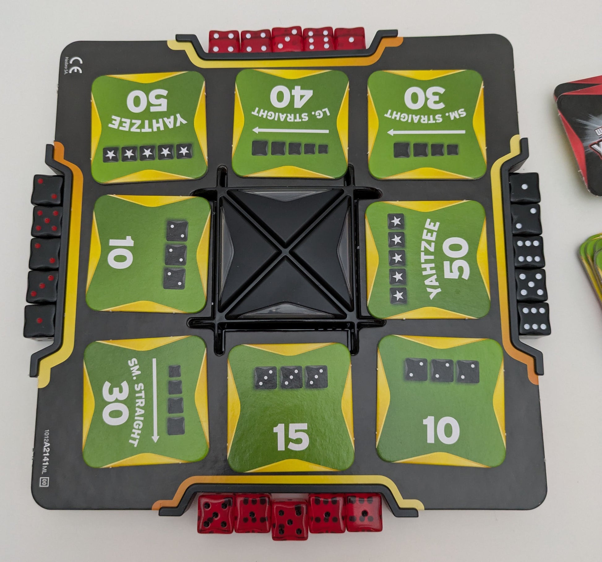 World Series of Yahtzee (2012) combines dice, cards and an electronic buzzer unit.